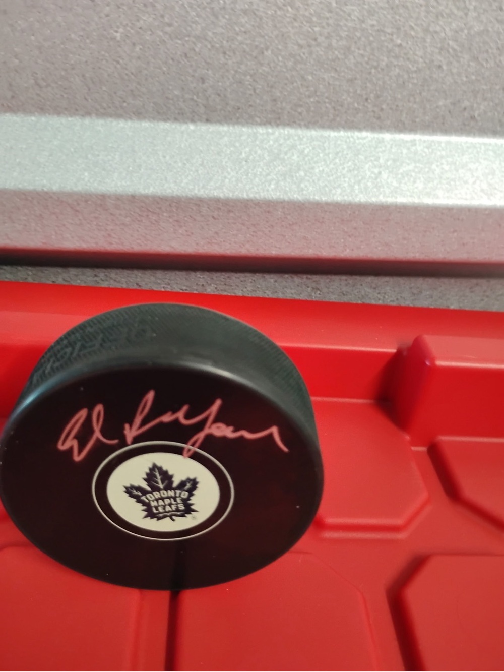Black Toronto Maple Leafs Souvenir Hockey Puck with Eddie Balfour Signature